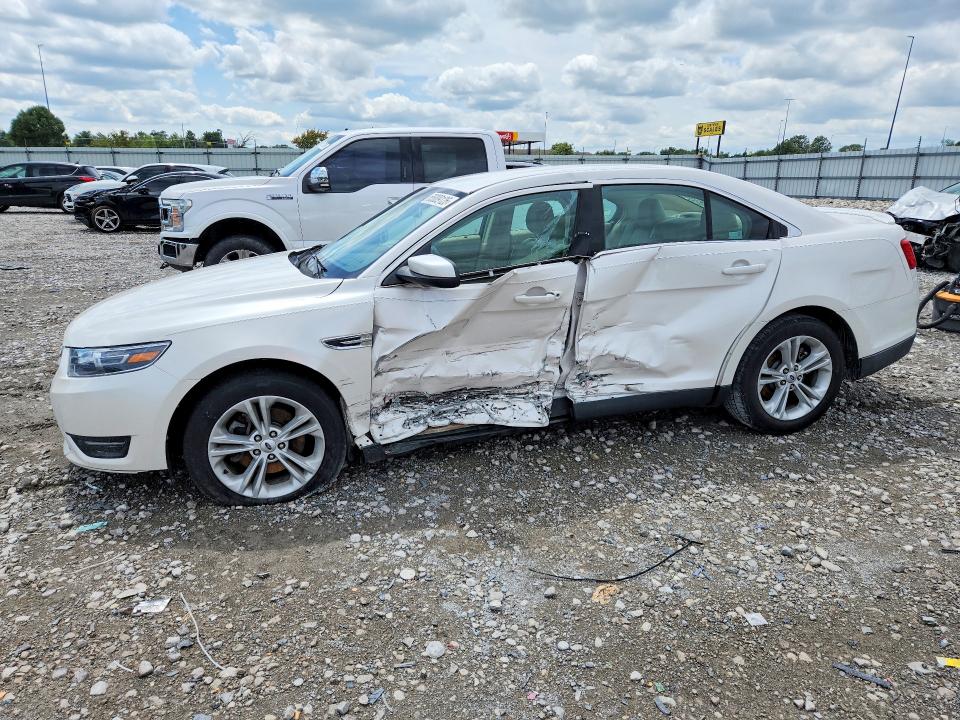 FORD TAURUS 2015 with VIN 1FAHP2E89FG179976 - Photo from auction