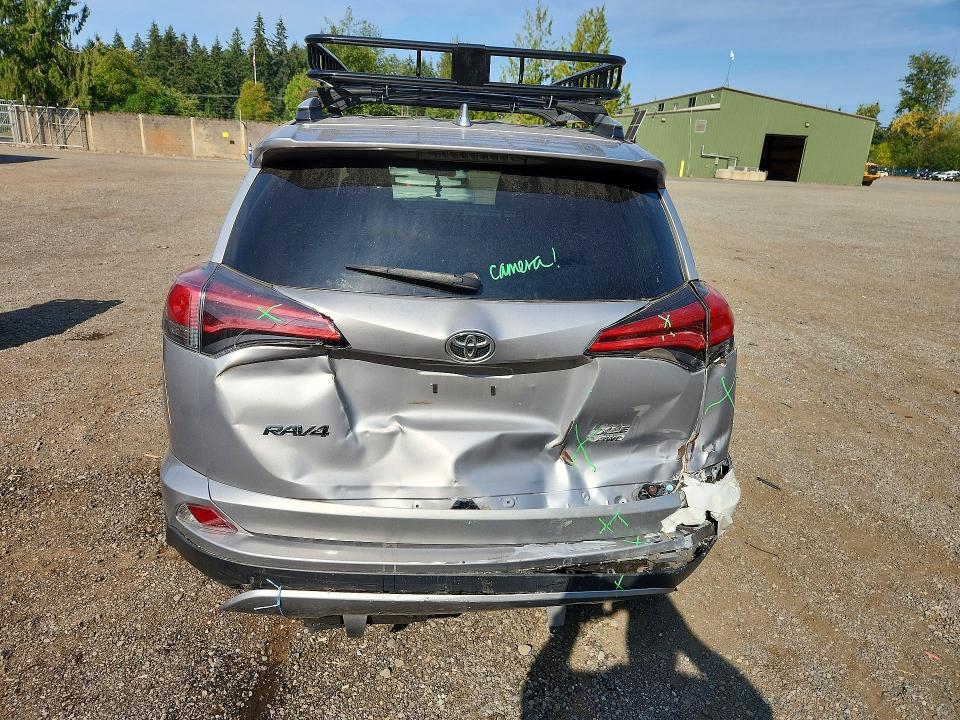 Фото 6 с аукциона – 2016 TOYOTA RAV4 с VIN 2T3RFREV1GW525847