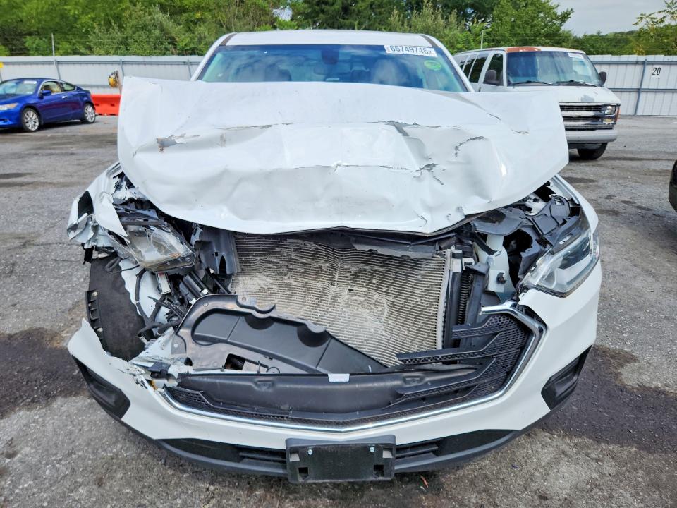 Photo 5 from auction – 2021 CHEVROLET TRAVERSE with VIN 1GNEVFKW3MJ123083
