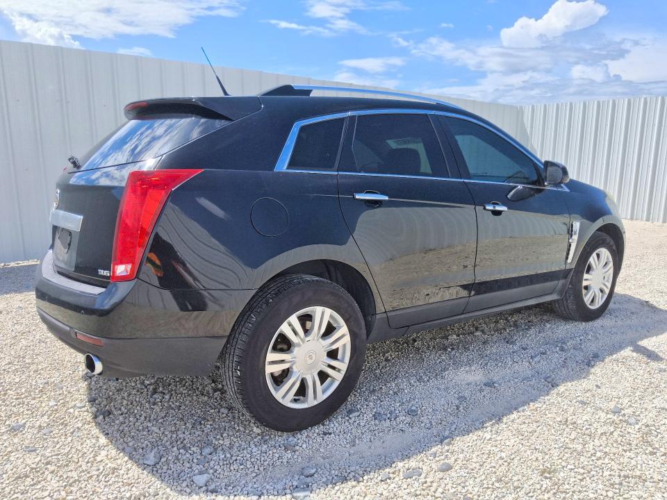Photo 3 from auction – 2012 CADILLAC SRX with VIN 3GYFNDE3XCS578619