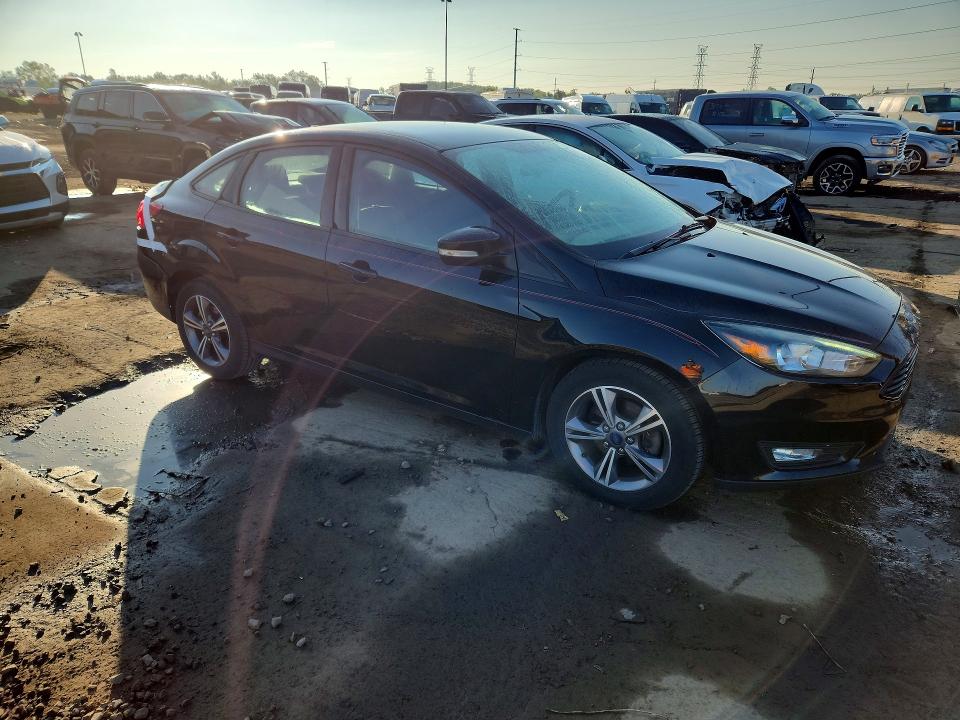 Photo 4 from auction – 2017 FORD FOCUS with VIN 1FADP3FE6HL302975