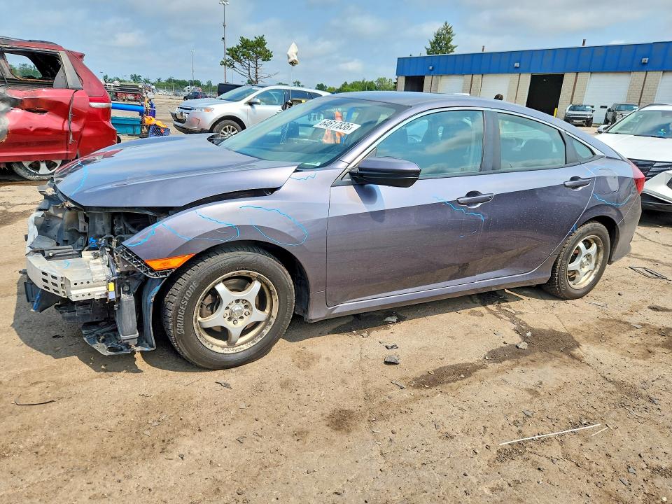 HONDA CIVIC 2018 with VIN 19XFC2F57JE000358 - Photo from auction