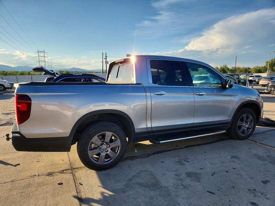 Photo 3 from auction – 2020 HONDA RIDGELINE with VIN 5FPYK3F70LB016991