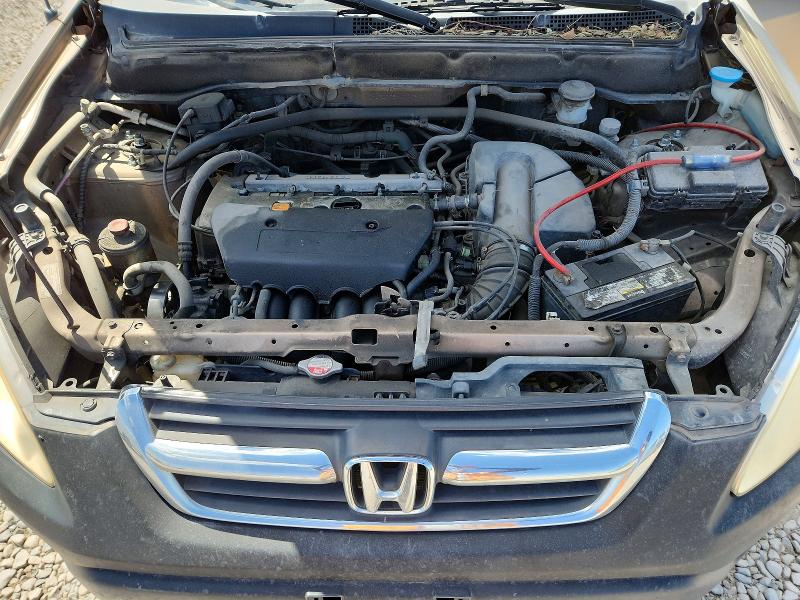 Photo 11 from auction – 2004 HONDA CR-V with VIN JHLRD775X4C006000