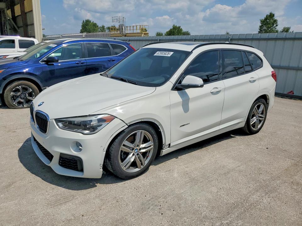 BMW X1 2017 with VIN WBXHT3C33H5F80656 - Photo from auction