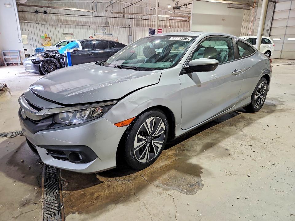 HONDA CIVIC 2016 with VIN 2HGFC3B71GH351780 - Photo from auction