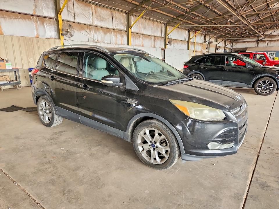 Photo 4 from auction – 2014 FORD ESCAPE with VIN 1FMCU0J97EUC85421