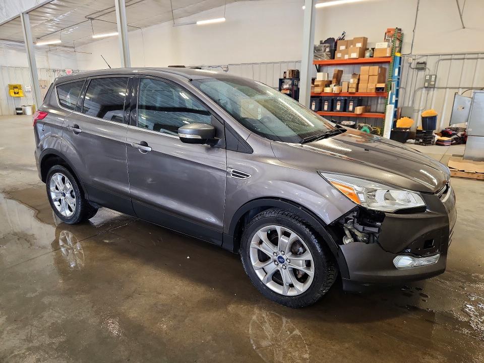 Photo 4 from auction – 2013 FORD ESCAPE with VIN 1FMCU0HX1DUD11675
