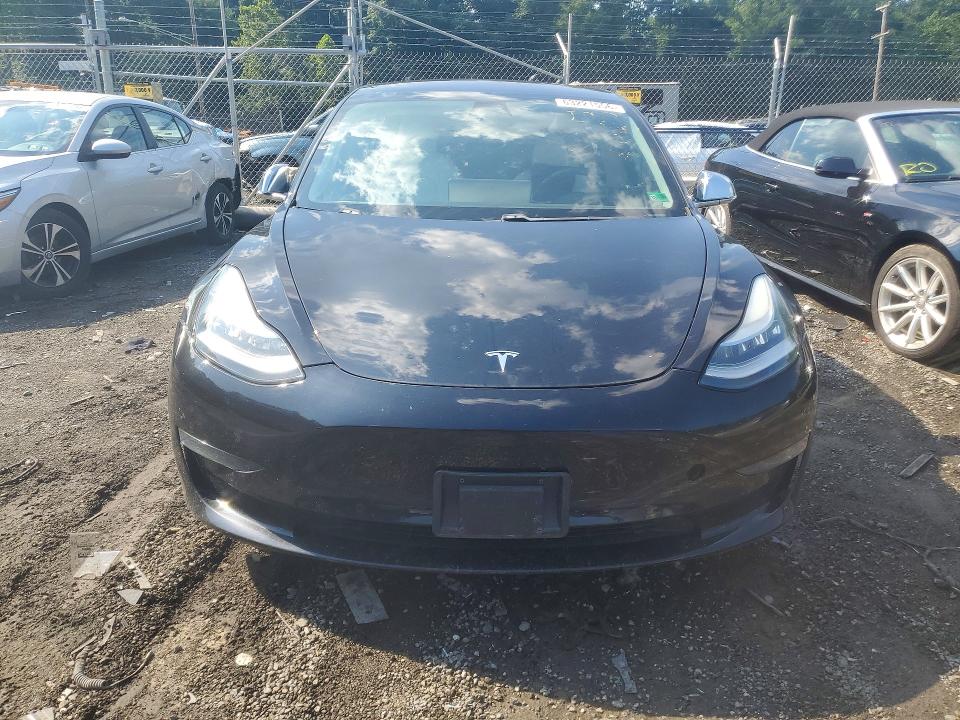 Photo 5 from auction – 2018 TESLA MODEL 3 with VIN 5YJ3E1EB0JF097072