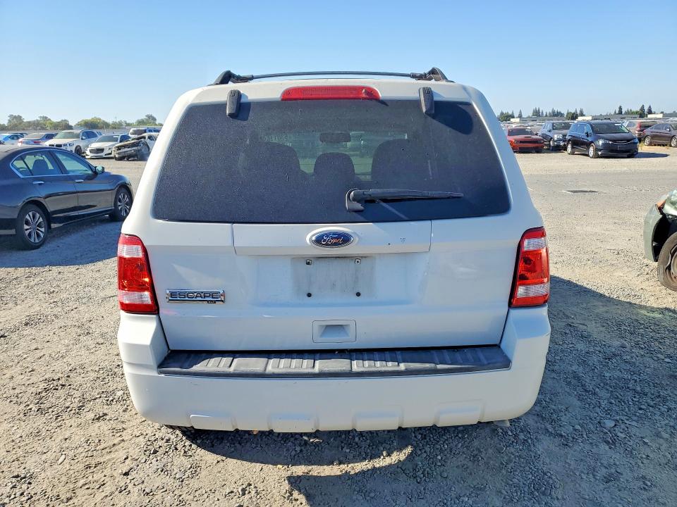 Photo 6 from auction – 2011 FORD ESCAPE with VIN 1FMCU0D79BKA14779