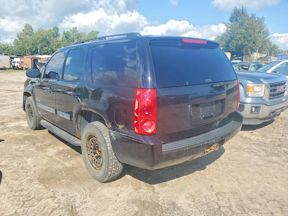 Photo 2 from auction – 2011 GMC YUKON with VIN 1GKS2AE05BR125726