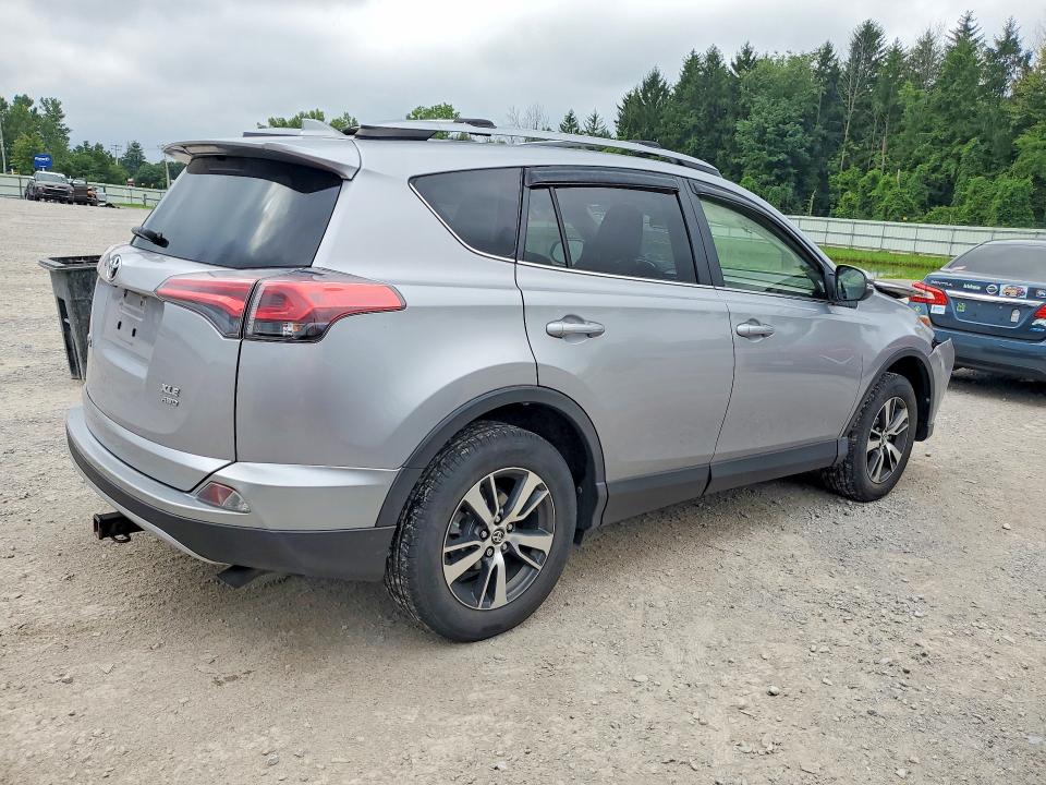 Photo 3 from auction – 2018 TOYOTA RAV4 with VIN JTMRFREV6JD235043