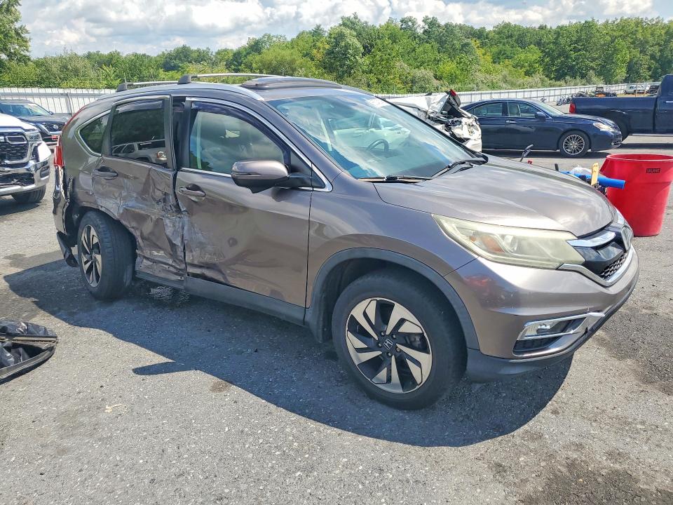 Photo 4 from auction – 2015 HONDA CR-V with VIN 5J6RM4H94FL041898