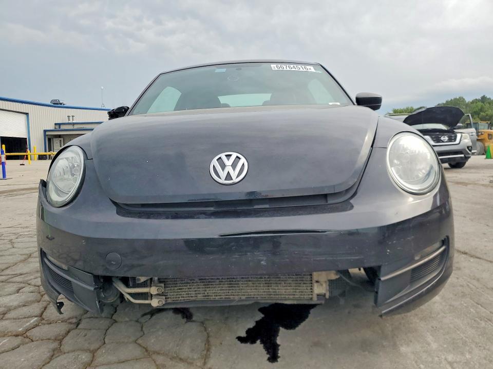 Photo 5 from auction – 2016 VOLKSWAGEN BEETLE with VIN 3VWF17AT8GM609771