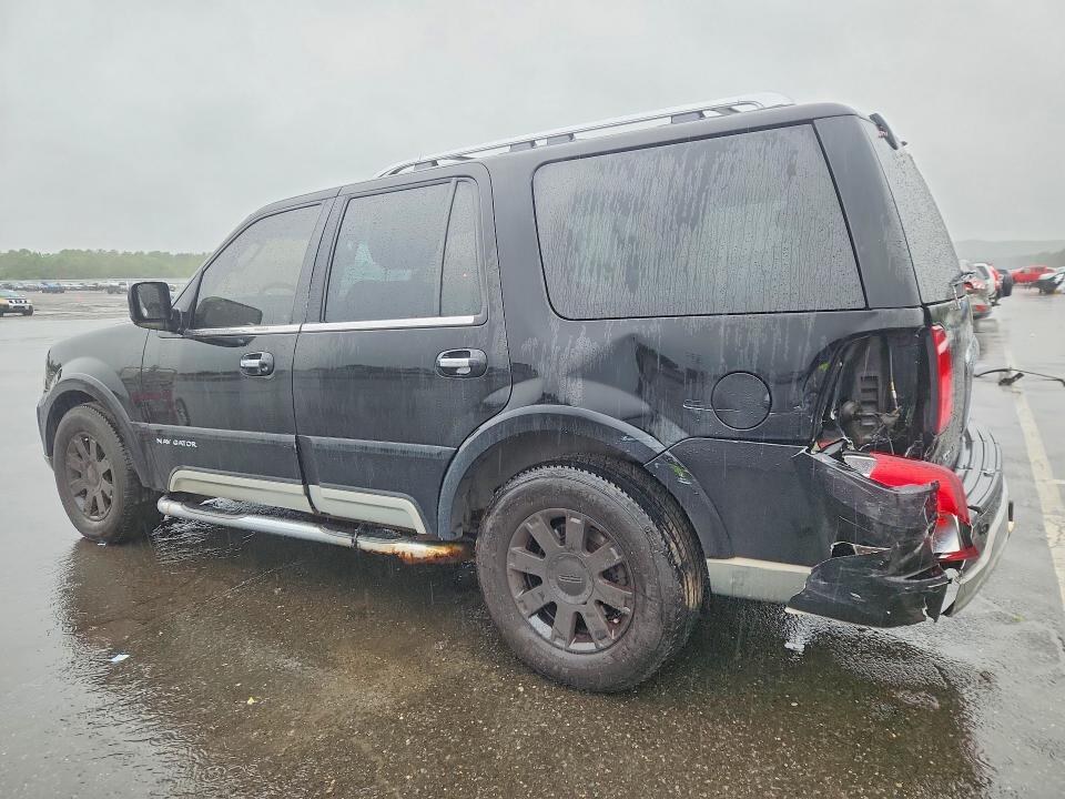 Photo 2 from auction – 2003 LINCOLN NAVIGATOR with VIN 5LMFU28R23LJ13845