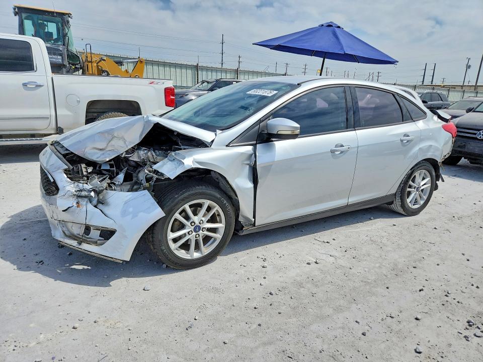 FORD FOCUS 2015 with VIN 1FADP3F2XFL257199 - Photo from auction