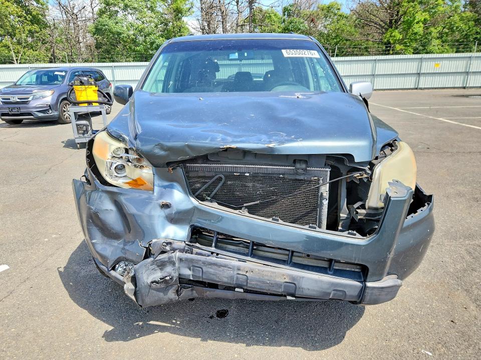 Photo 5 from auction – 2006 HONDA PILOT with VIN 5FNYF18456B007146