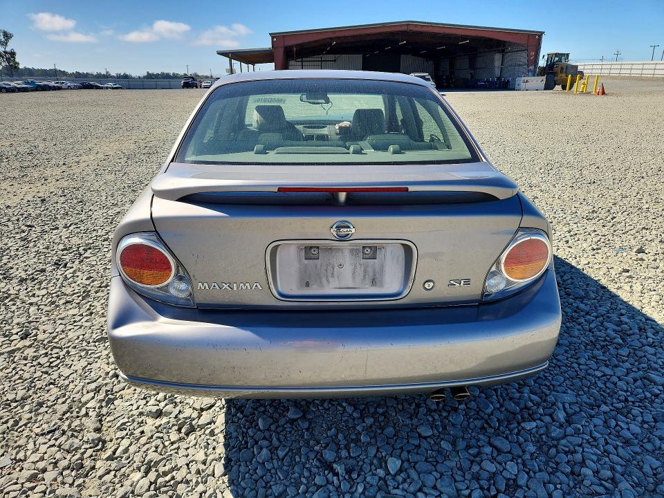 Photo 6 from auction – 2002 NISSAN MAXIMA with VIN JN1DA31D92T448646