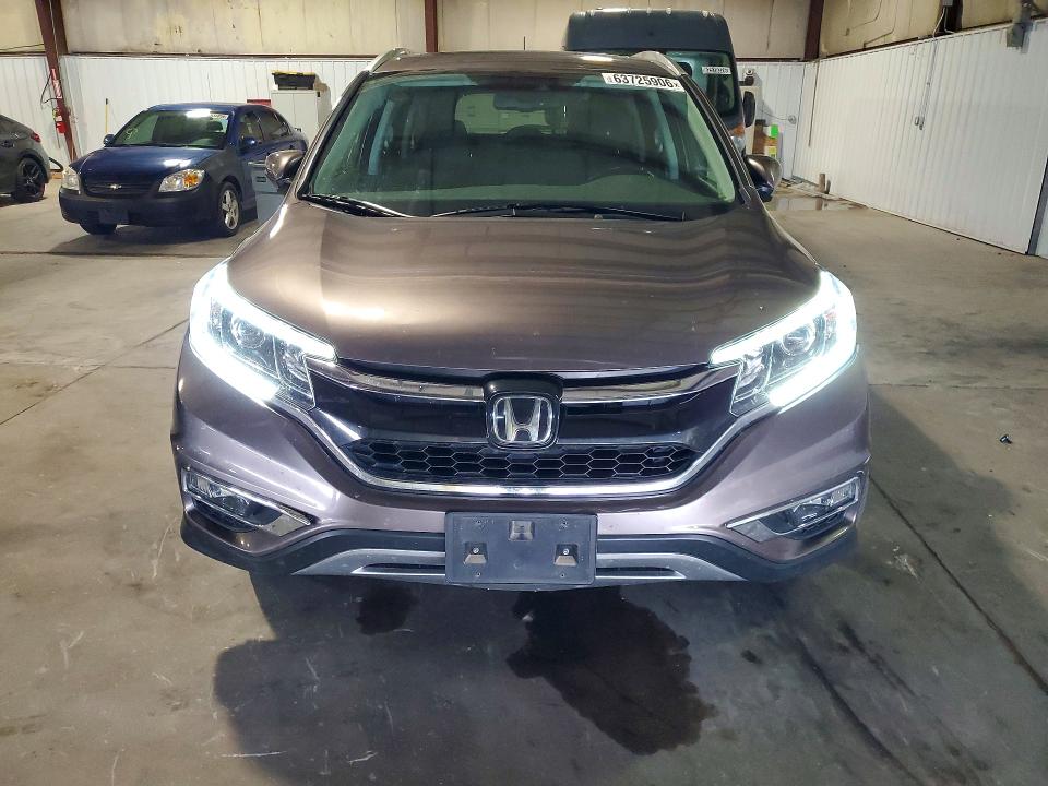 Photo 5 from auction – 2016 HONDA CR-V with VIN 5J6RM4H92GL115045
