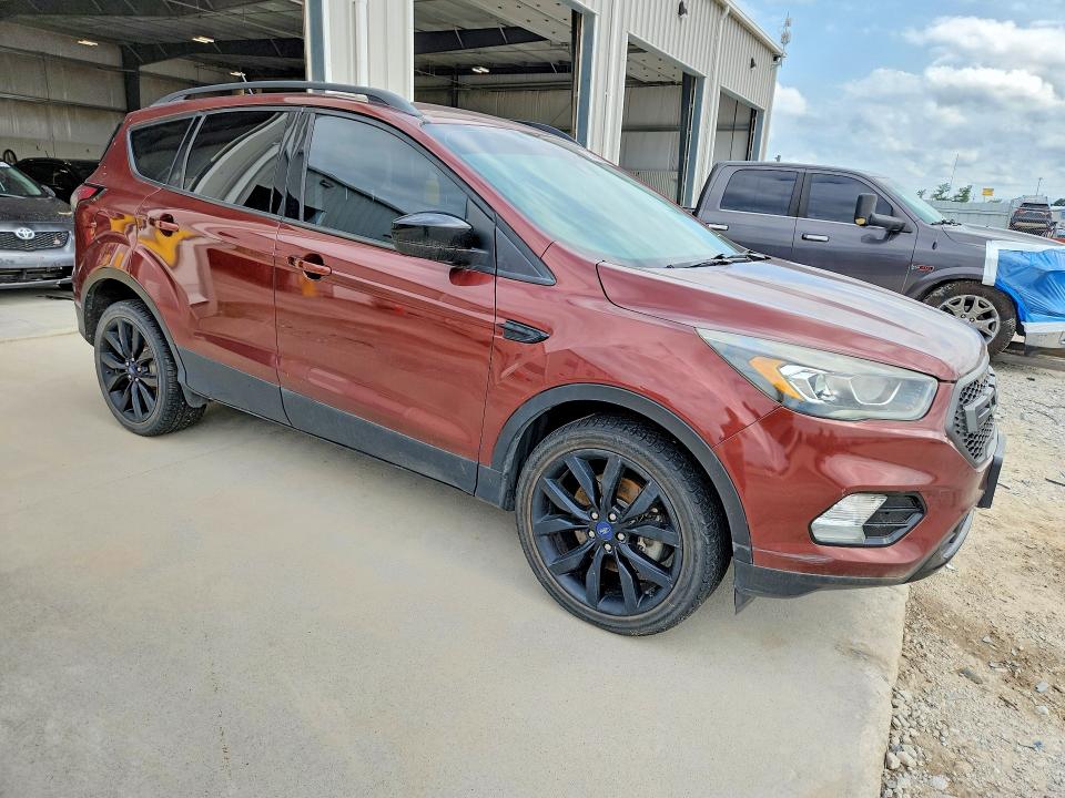 Photo 4 from auction – 2018 FORD ESCAPE with VIN 1FMCU9GD6JUA22816