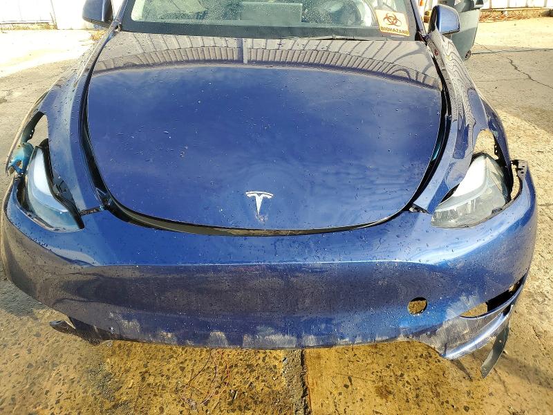 Photo 11 from auction – 2023 TESLA MODEL Y with VIN 7SAYGDEE5PF848867