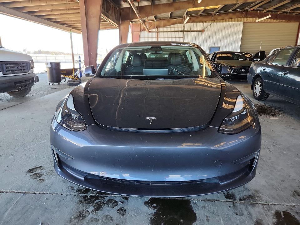 Photo 5 from auction – 2021 TESLA MODEL 3 with VIN 5YJ3E1EA5MF876690