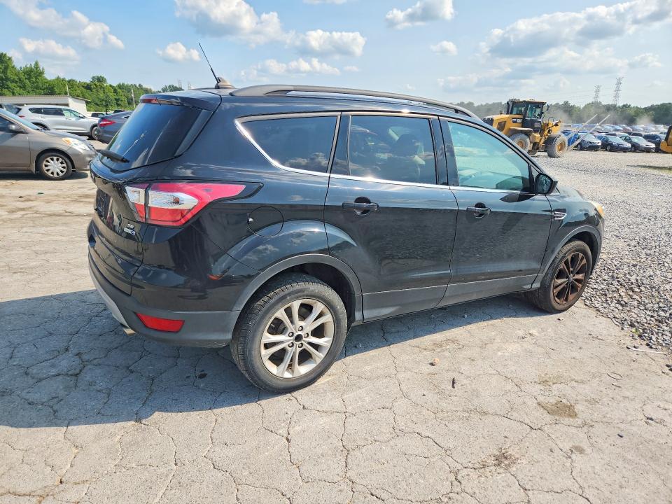 Photo 3 from auction – 2018 FORD ESCAPE with VIN 1FMCU9GD8JUD58046