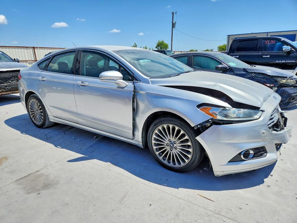 Photo 4 from auction – 2016 FORD FUSION with VIN 3FA6P0K96GR218204