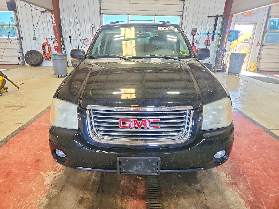 Photo 5 from auction – 2009 GMC ENVOY with VIN 1GKDT43S092132095