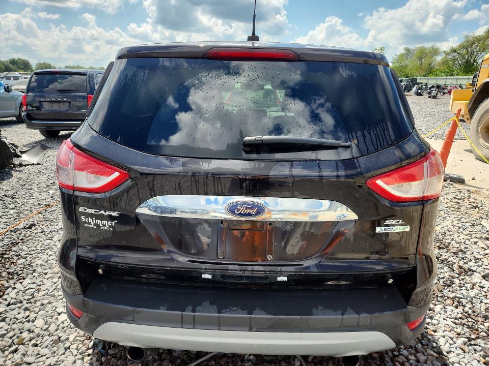 Photo 6 from auction – 2013 FORD ESCAPE with VIN 1FMCU0HX1DUB52110