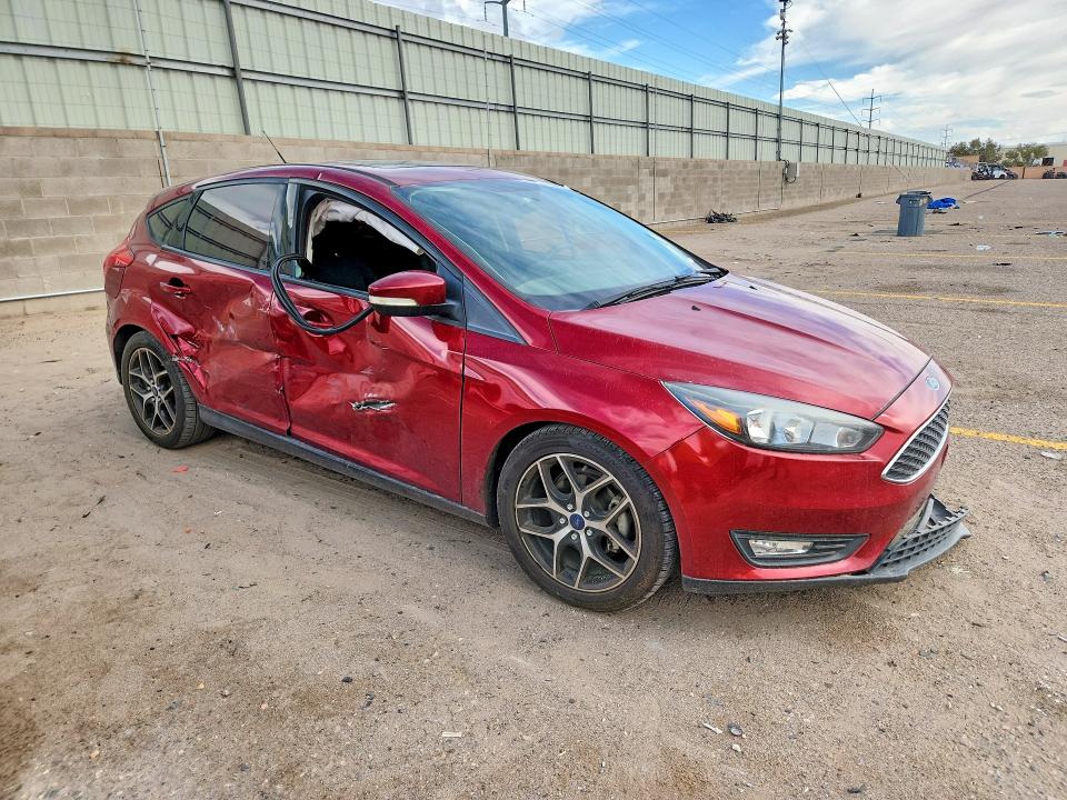 Foto 4 de la subasta – 2017 FORD FOCUS con VIN 1FADP3M28HL219637