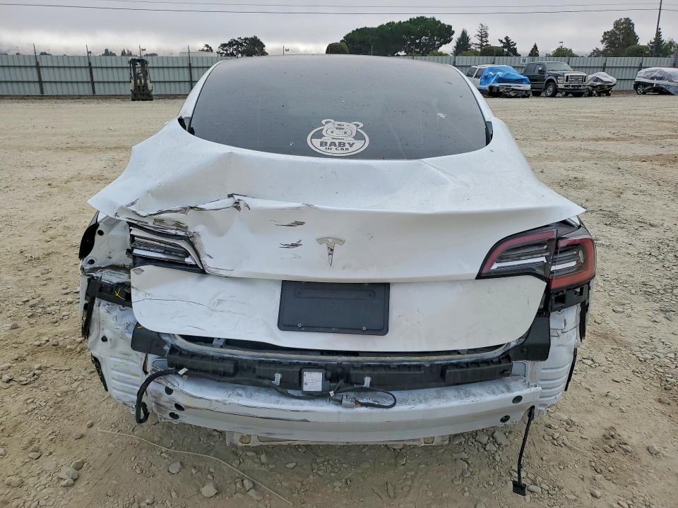 Photo 6 from auction – 2022 TESLA MODEL 3 with VIN 5YJ3E1EAXNF249775