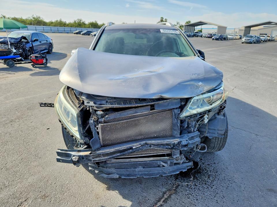 Photo 5 from auction – 2014 KIA SORENTO with VIN 5XYKT3A65EG436560