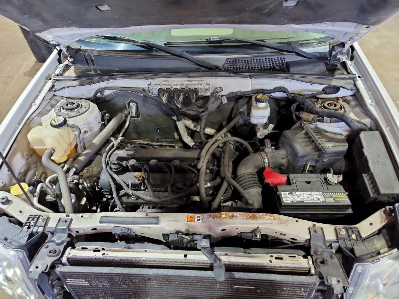 Photo 12 from auction – 2009 FORD ESCAPE with VIN 1FMCU93709KA20583