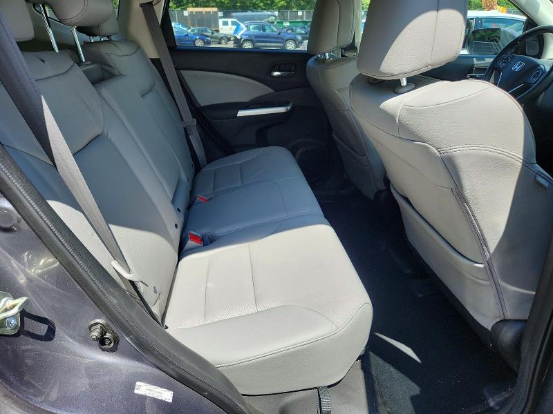 Photo 11 from auction – 2015 HONDA CR-V with VIN 2HKRM4H77FH608307