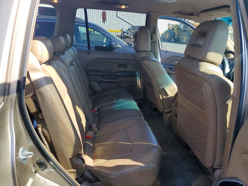 Фото 10 с аукциона – 2004 HONDA PILOT с VIN 2HKYF18704H500774