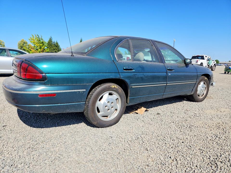 Снимка 3 от търг – 1998 CHEVROLET LUMINA с VIN 2G1WL52M2W9235747