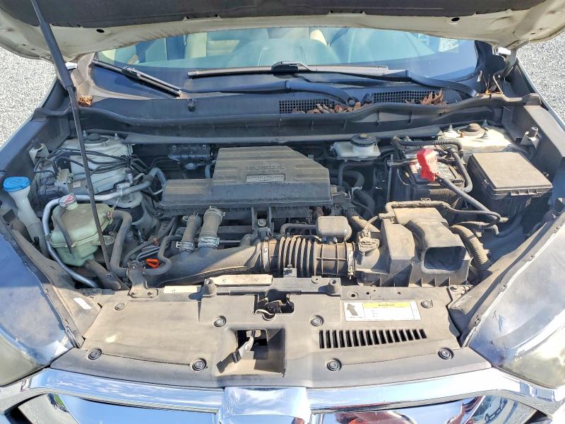 Photo 12 from auction – 2017 HONDA CR-V with VIN 2HKRW1H58HH507643