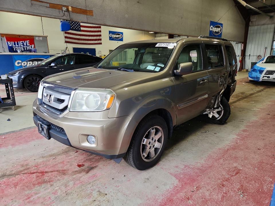 HONDA PILOT 2011 with VIN 5FNYF4H97BB072037 - Photo from auction