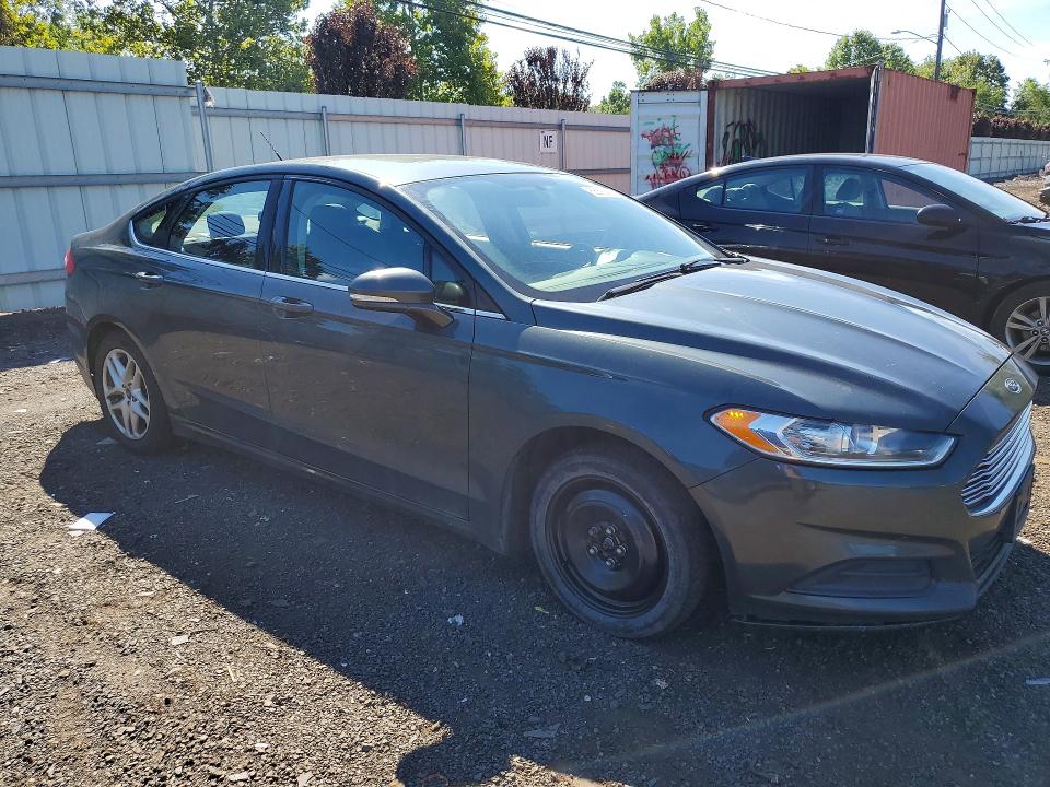 Photo 4 from auction – 2015 FORD FUSION with VIN 3FA6P0H71FR154173
