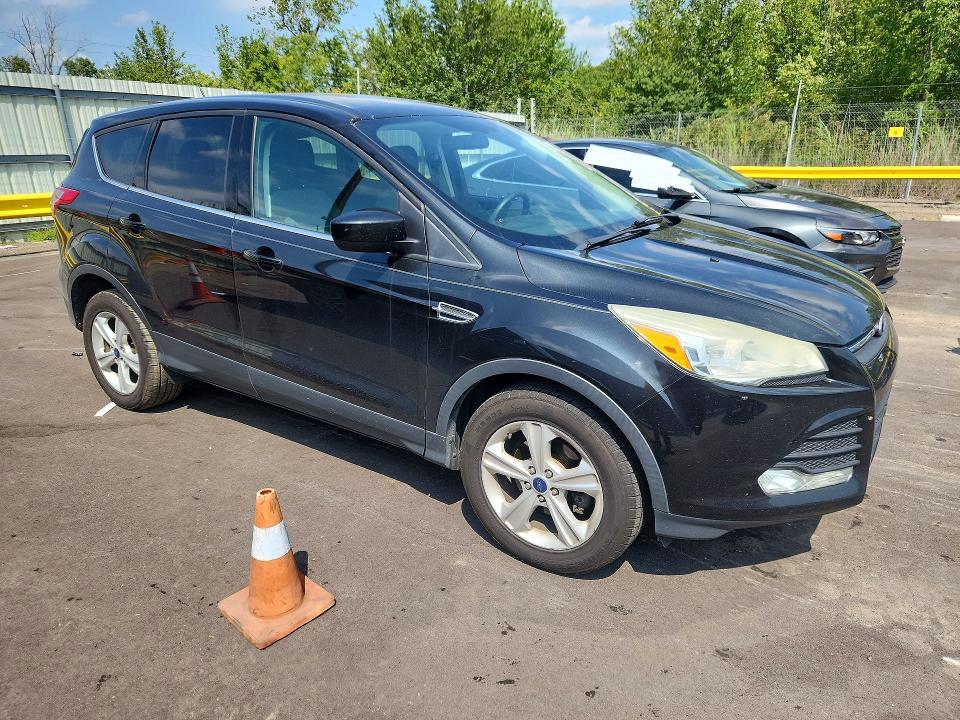 Photo 4 from auction – 2015 FORD ESCAPE with VIN 1FMCU0GX6FUB48042
