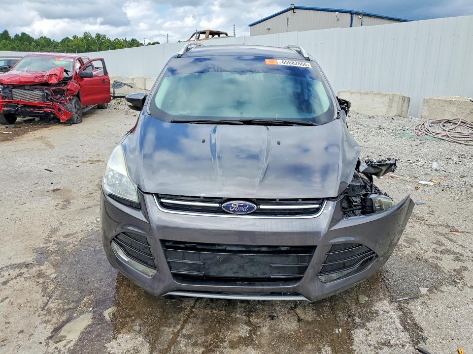 Photo 5 from auction – 2016 FORD ESCAPE with VIN 1FMCU9J98GUC30595