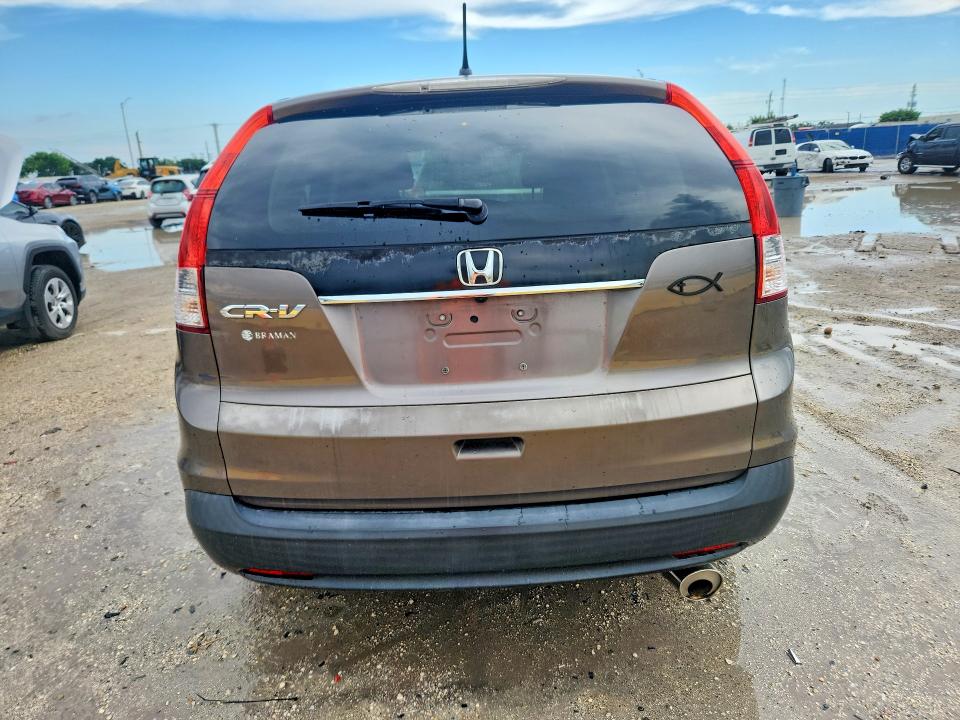 Photo 6 from auction – 2013 HONDA CR-V with VIN 3CZRM3H53DG704668