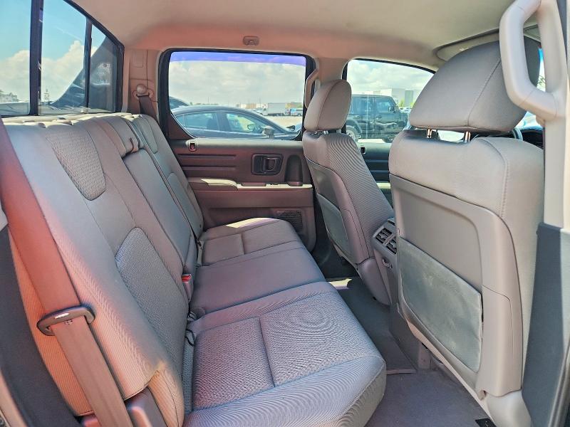 Photo 10 from auction – 2011 HONDA RIDGELINE with VIN 5FPYK1F26BB003704