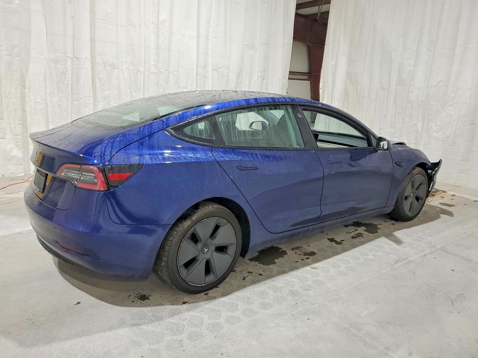 Photo 3 from auction – 2022 TESLA MODEL 3 with VIN 5YJ3E1EA3NF369773