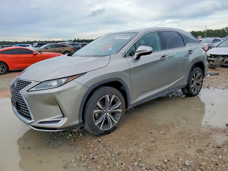 LEXUS RX 2021 with VIN 2T2HZMAA7MC195626 - Photo from auction