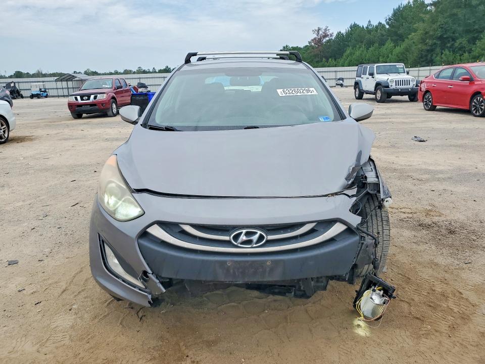 Photo 5 from auction – 2013 HYUNDAI ELANTRA GT with VIN KMHD35LE6DU090956