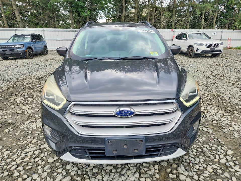 Photo 5 from auction – 2017 FORD ESCAPE with VIN 1FMCU9G98HUE20261