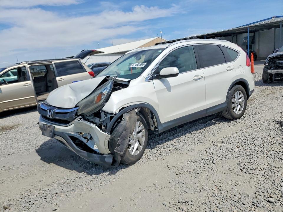 Photo 1 from auction – 2016 HONDA CR-V with VIN 5J6RM4H75GL121212