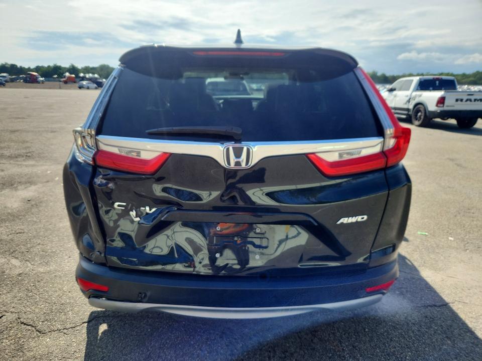 Photo 6 from auction – 2018 HONDA CR-V with VIN 7FARW2H54JE104578